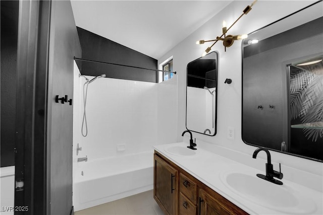 21 Rue De Degas, Henderson, NV 89074 - bathroom featuring double vanity, shower / washtub combination, lofted ceiling, and tile patterned floors