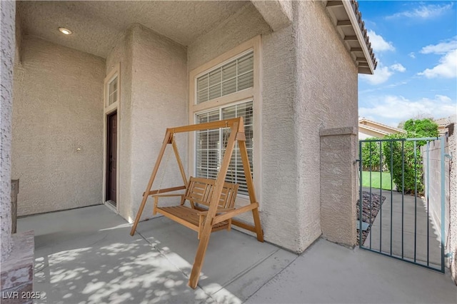 21 Rue De Degas, Henderson, NV 89074 - doorway to property with stucco siding and a gate