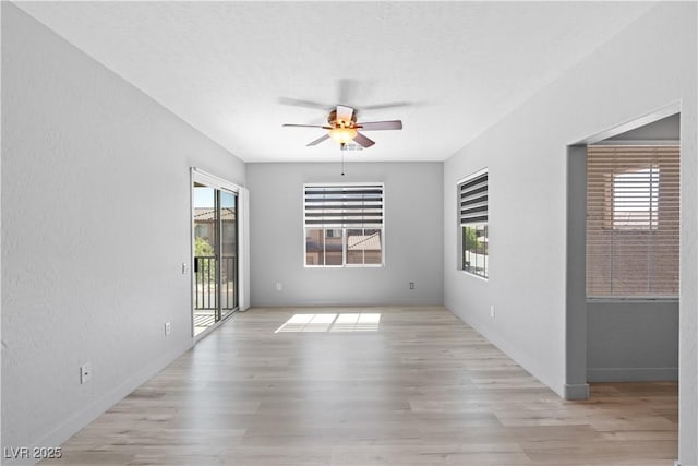 6635 Caporetto Ln Unit 204, North Las Vegas, NV 89084 - empty room with ceiling fan and light wood-style flooring