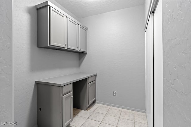 6635 Caporetto Ln Unit 204, North Las Vegas, NV 89084 - washroom featuring light tile patterned floors and baseboards