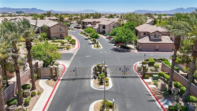 6635 Caporetto Ln Unit 204, North Las Vegas, NV 89084 - aerial view of residential area featuring a mountainous background