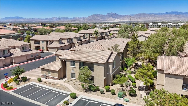 6635 Caporetto Ln Unit 204, North Las Vegas, NV 89084 - aerial perspective of suburban area with a mountain backdrop