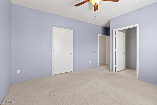 6635 Caporetto Ln Unit 204, North Las Vegas, NV 89084 - unfurnished bedroom with carpet and a ceiling fan