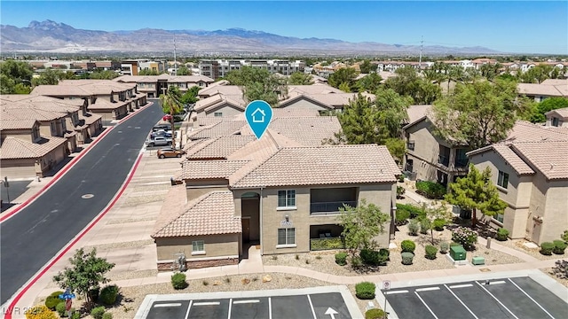 6635 Caporetto Ln Unit 204, North Las Vegas, NV 89084 - aerial perspective of suburban area featuring a mountain backdrop
