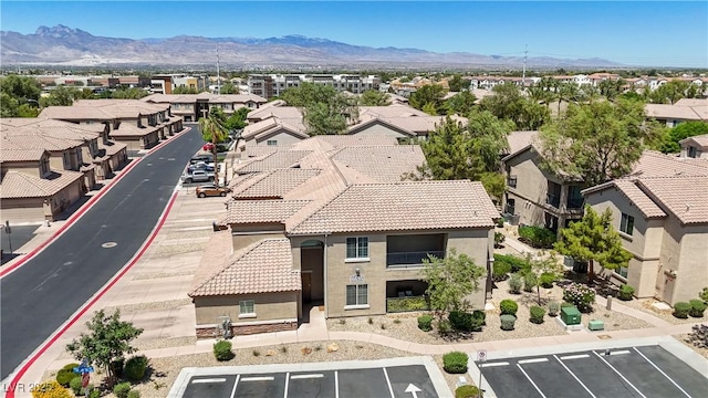 6635 Caporetto Ln Unit 204, North Las Vegas, NV 89084 - aerial perspective of suburban area with a mountainous background