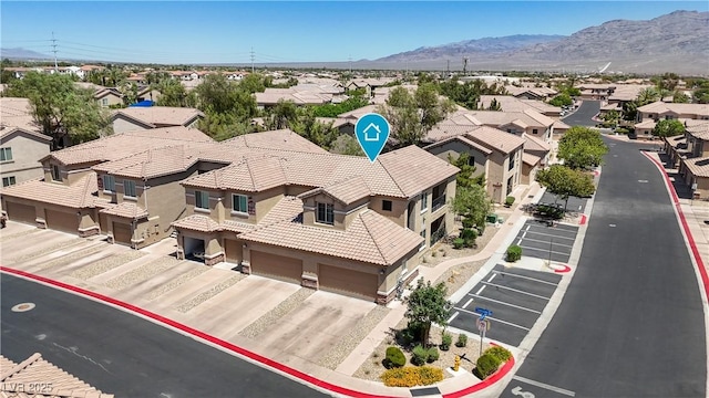 6635 Caporetto Ln Unit 204, North Las Vegas, NV 89084 - aerial view of residential area featuring a mountainous background