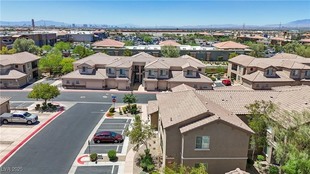6635 Caporetto Ln Unit 204, North Las Vegas, NV 89084 - aerial perspective of suburban area featuring a mountainous background