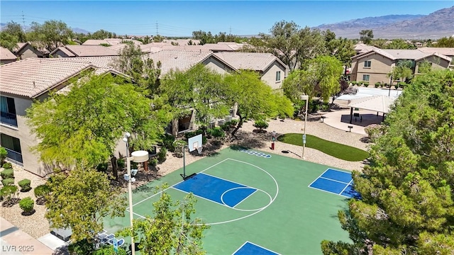 6635 Caporetto Ln Unit 204, North Las Vegas, NV 89084 - view of sport court featuring a residential view, community basketball court, and a mountain view