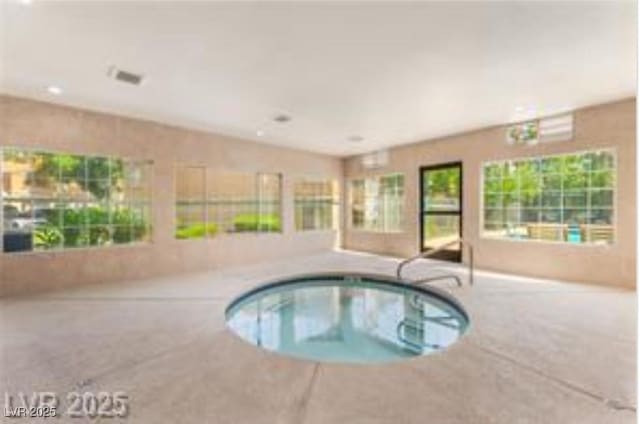 221 Mission Catalina Ln Unit 104, Las Vegas, NV 89107 - view of swimming pool with an in-ground hot tub