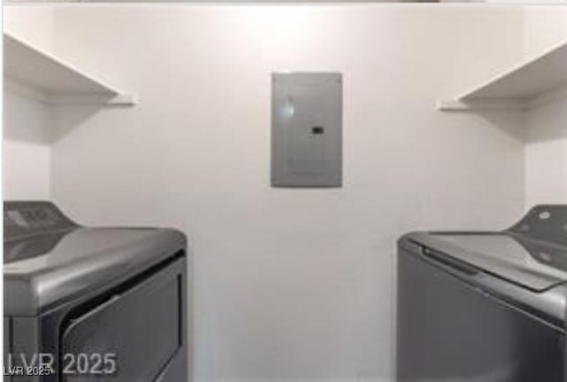 221 Mission Catalina Ln Unit 104, Las Vegas, NV 89107 - laundry room with electric panel and washer and dryer