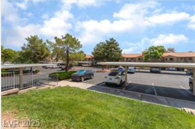 221 Mission Catalina Ln Unit 104, Las Vegas, NV 89107 - view of partially covered parking lot