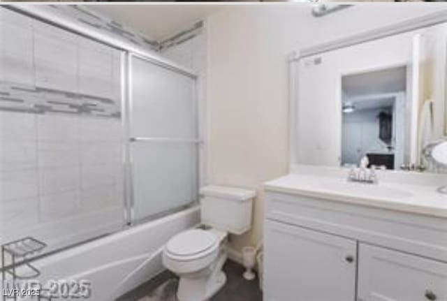 221 Mission Catalina Ln Unit 104, Las Vegas, NV 89107 - bathroom with vanity and bath / shower combo with glass door