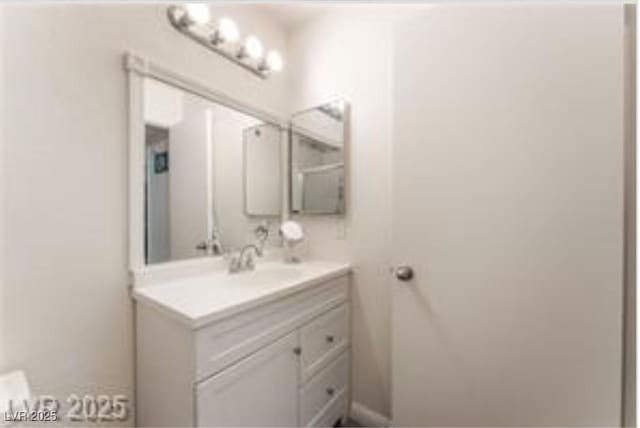 221 Mission Catalina Ln Unit 104, Las Vegas, NV 89107 - bathroom featuring vanity