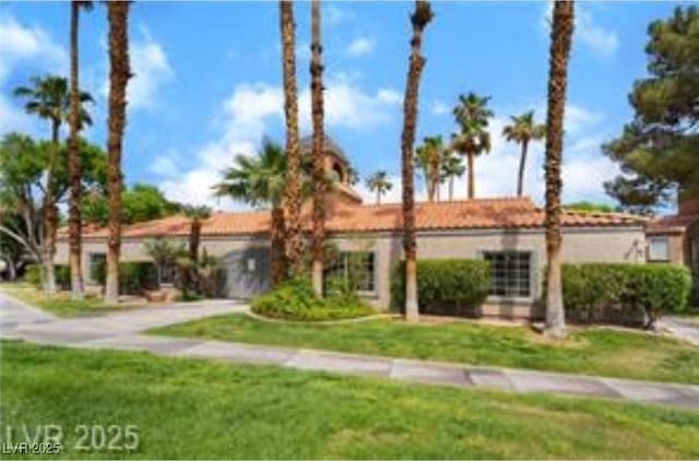 221 Mission Catalina Ln Unit 104, Las Vegas, NV 89107 - view of front of property with a front yard