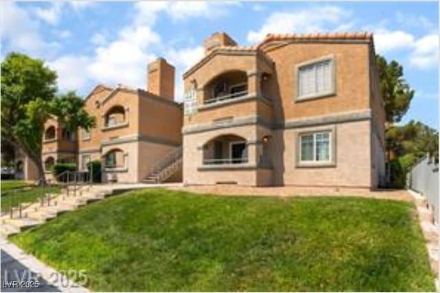 221 Mission Catalina Ln Unit 104, Las Vegas, NV 89107 - view of property with stairway
