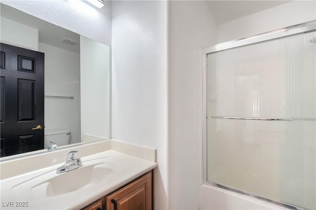 8798 Tom Noon Ave Unit 103, Las Vegas, NV 89178 - full bathroom featuring an enclosed shower and vanity