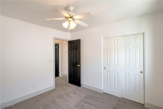 8798 Tom Noon Ave Unit 103, Las Vegas, NV 89178 - unfurnished bedroom with carpet floors, a closet, and a ceiling fan