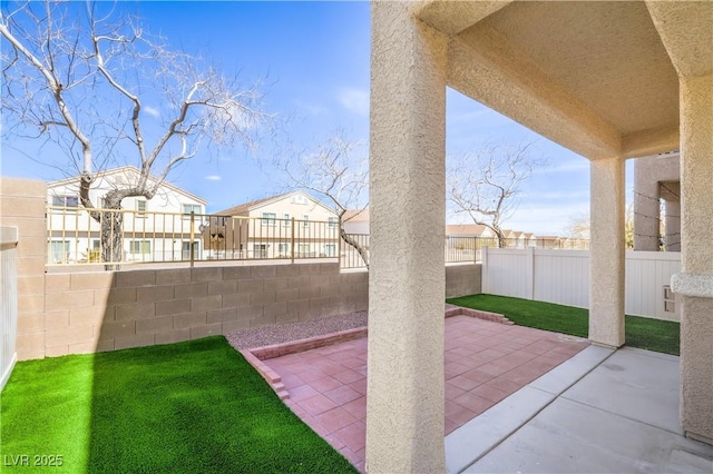 8798 Tom Noon Ave Unit 103, Las Vegas, NV 89178 - fenced backyard featuring a patio area