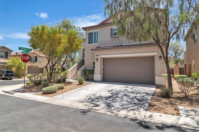 7775 Santos Bay Ct, Las Vegas, NV 89179 - traditional-style house featuring stucco siding, an attached garage, driveway, and stairs