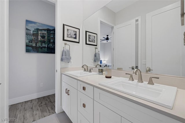 10271 Meridian Hill Ave, Las Vegas, NV 89135 - full bath featuring double vanity, ceiling fan, and wood finished floors