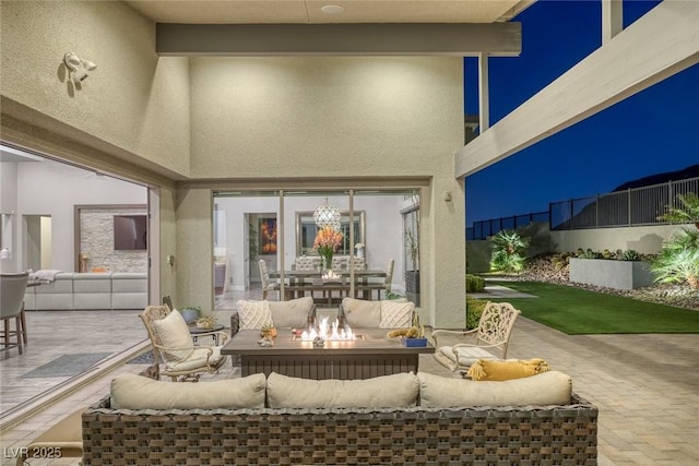 10271 Meridian Hill Ave, Las Vegas, NV 89135 - view of patio / terrace with an outdoor living space with a fire pit