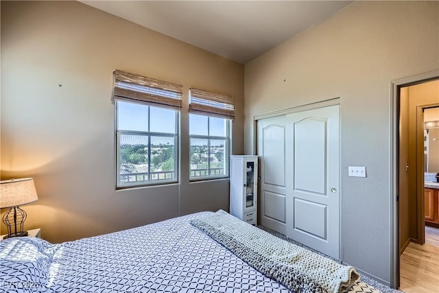 2325 Windmill Pkwy Unit 1622, Henderson, NV 89074 - bedroom featuring a closet and light wood finished floors