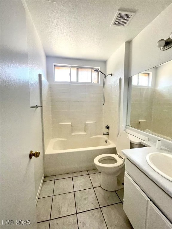 2405 Prime Advantage Ave, North Las Vegas, NV 89032 - bathroom with vanity, bathing tub / shower combination, tile patterned floors, and a textured ceiling