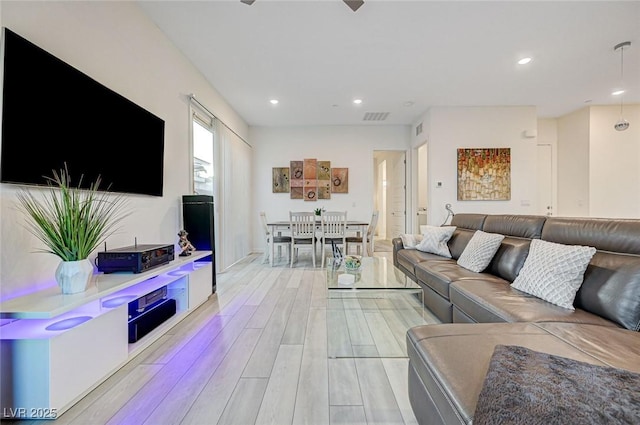 912 Allister Fields Ln, Las Vegas, NV 89138 - living area with light wood-style floors and recessed lighting