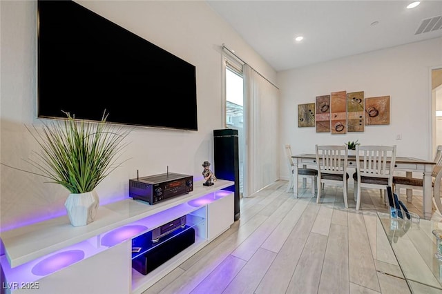912 Allister Fields Ln, Las Vegas, NV 89138 - living room with light wood finished floors and recessed lighting
