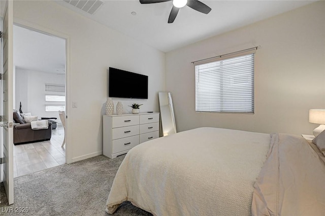 912 Allister Fields Ln, Las Vegas, NV 89138 - bedroom with carpet floors, multiple windows, and a ceiling fan