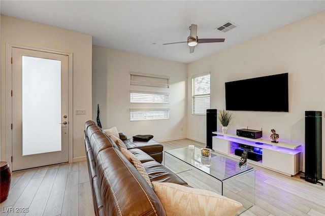 912 Allister Fields Ln, Las Vegas, NV 89138 - living area with light wood finished floors and a ceiling fan