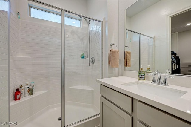 912 Allister Fields Ln, Las Vegas, NV 89138 - bathroom with a stall shower, vanity, and a walk in closet