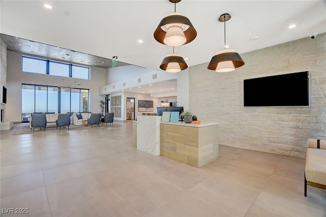 912 Allister Fields Ln, Las Vegas, NV 89138 - welcome area with a towering ceiling, a security system, and recessed lighting
