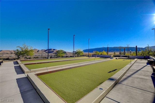 912 Allister Fields Ln, Las Vegas, NV 89138 - view of community with a game area and a mountain view