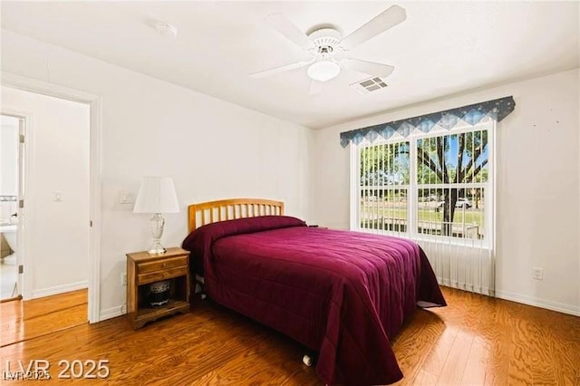 1470 St Joseph St, Overton, NV 89040 - bedroom with wood finished floors and a ceiling fan
