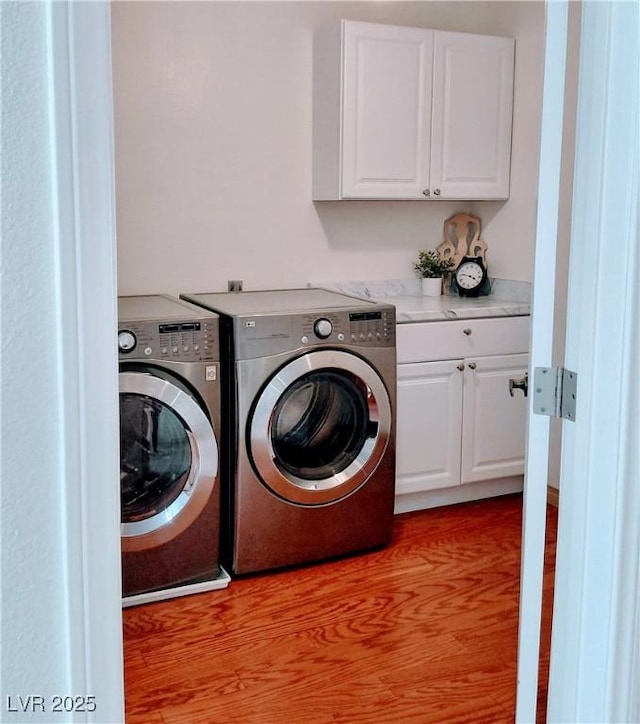 1470 St Joseph St, Overton, NV 89040 - washroom featuring washer and clothes dryer and cabinet space