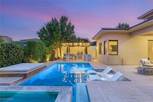 38 Moonfire Dr, Las Vegas, NV 89135 - view of swimming pool featuring a pool with connected hot tub and a patio