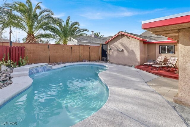 5005 Harmony Ave, Las Vegas, NV 89107 - view of swimming pool featuring a fenced backyard and a patio area