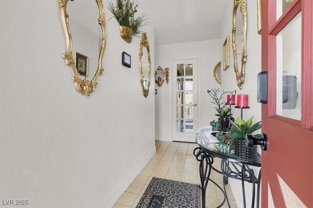5005 Harmony Ave, Las Vegas, NV 89107 - hallway featuring light tile patterned floors