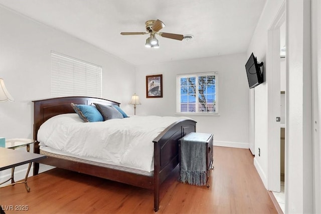 5005 Harmony Ave, Las Vegas, NV 89107 - bedroom with wood finished floors and ceiling fan