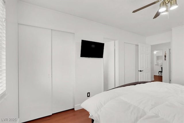 5005 Harmony Ave, Las Vegas, NV 89107 - bedroom featuring wood finished floors and a ceiling fan