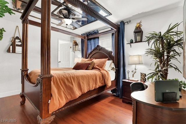 5005 Harmony Ave, Las Vegas, NV 89107 - bedroom with wood finished floors and an office area