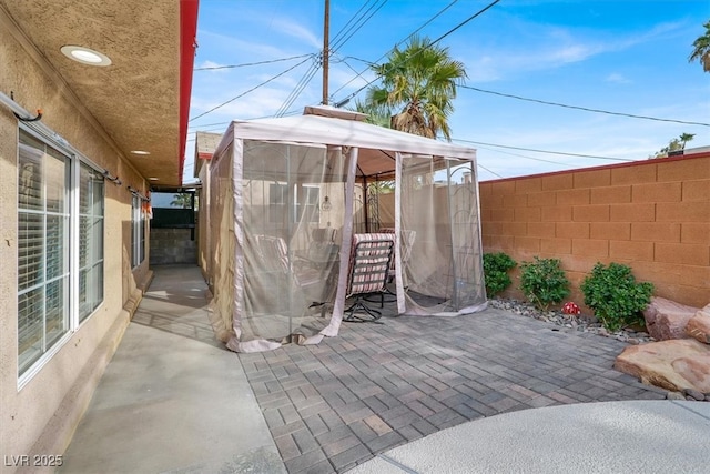 5005 Harmony Ave, Las Vegas, NV 89107 - fenced backyard featuring a gazebo and a patio area