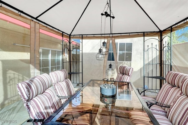 5005 Harmony Ave, Las Vegas, NV 89107 - sunroom with outdoor dining area