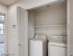 1891 Via Del Prado St, Las Vegas, NV 89115 - laundry area featuring washing machine and clothes dryer