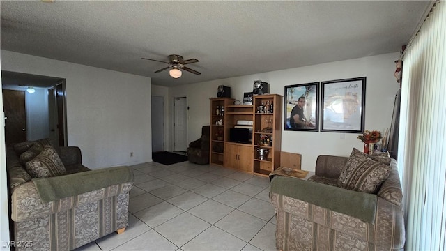 5209 Del Monte Ave, Las Vegas, NV 89146 - living area featuring a ceiling fan and light tile patterned floors