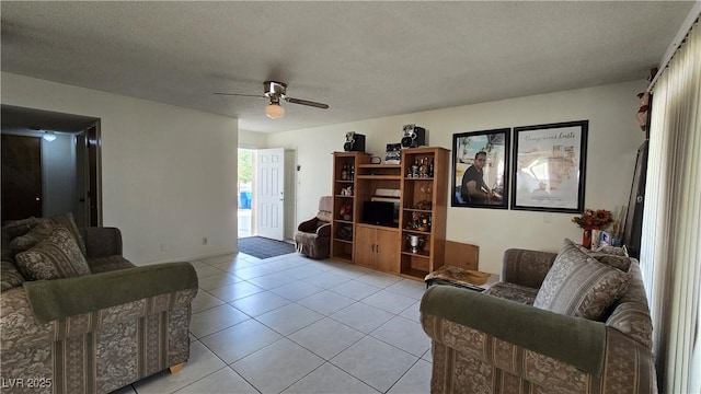 5209 Del Monte Ave, Las Vegas, NV 89146 - living area with ceiling fan, light tile patterned floors, and a textured ceiling