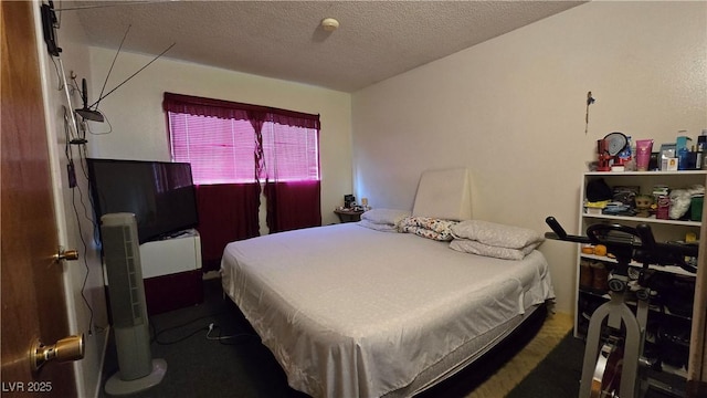 5209 Del Monte Ave, Las Vegas, NV 89146 - carpeted bedroom featuring a textured ceiling