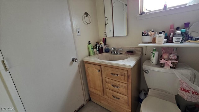5209 Del Monte Ave, Las Vegas, NV 89146 - bathroom featuring toilet and vanity