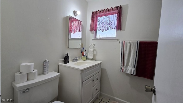 5209 Del Monte Ave, Las Vegas, NV 89146 - half bathroom with vanity and tile patterned flooring